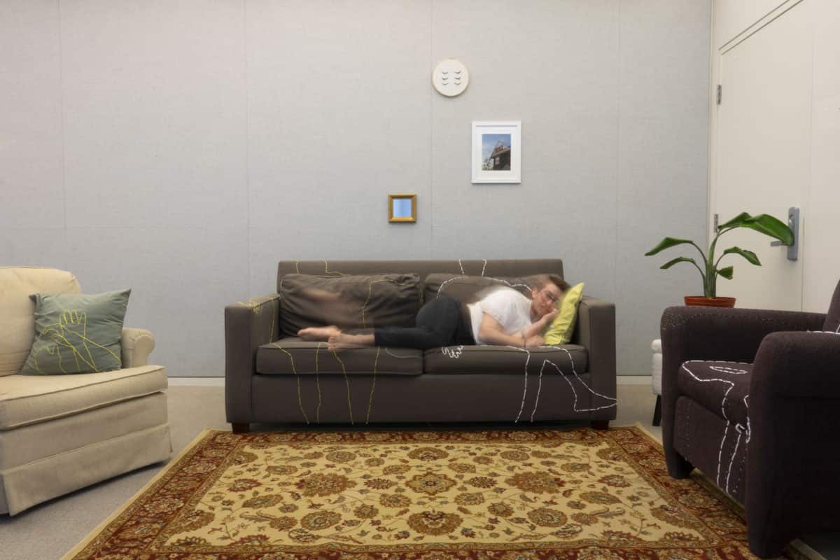 Self-portrait of a man on a couch